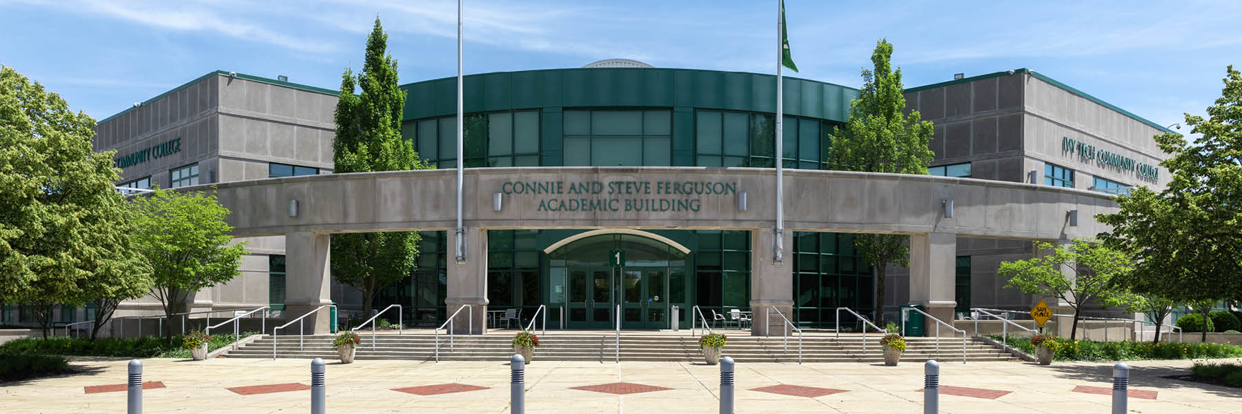 The Connie and Steve Ferguson Academic Building on the Ivy Tech Bloomington campus on a sunny day.